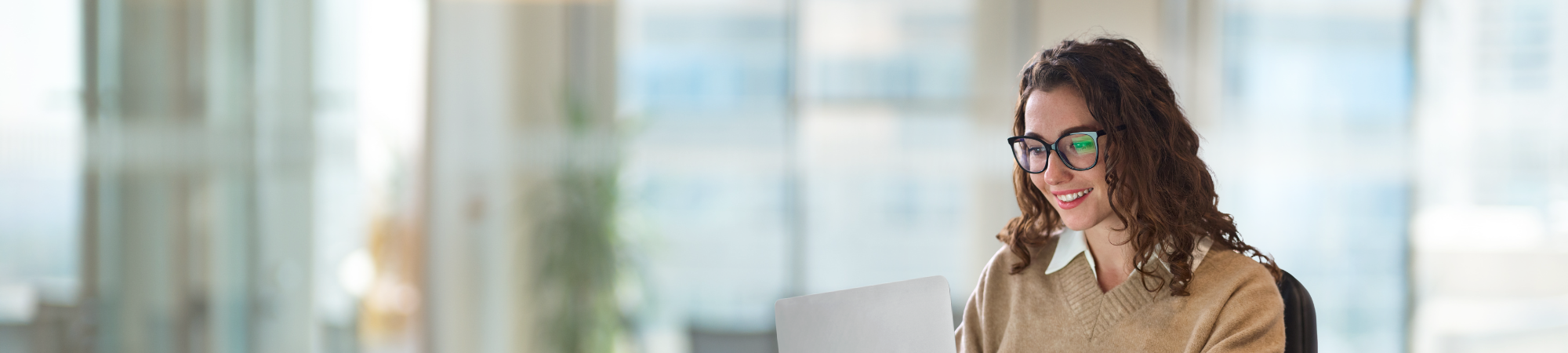 Smiling businesswoman in an office. 