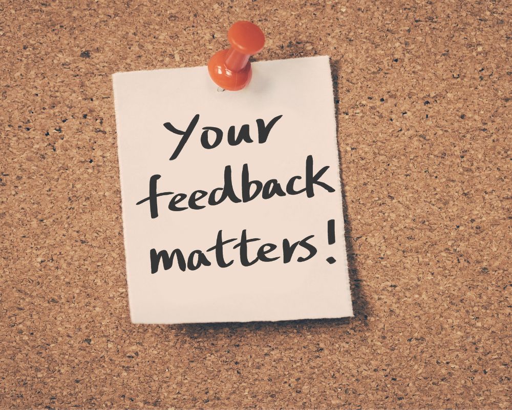 Your feedback matters note on cork board