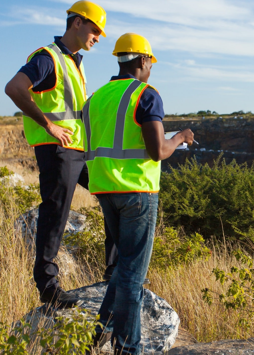 Two contractors discussing work at site