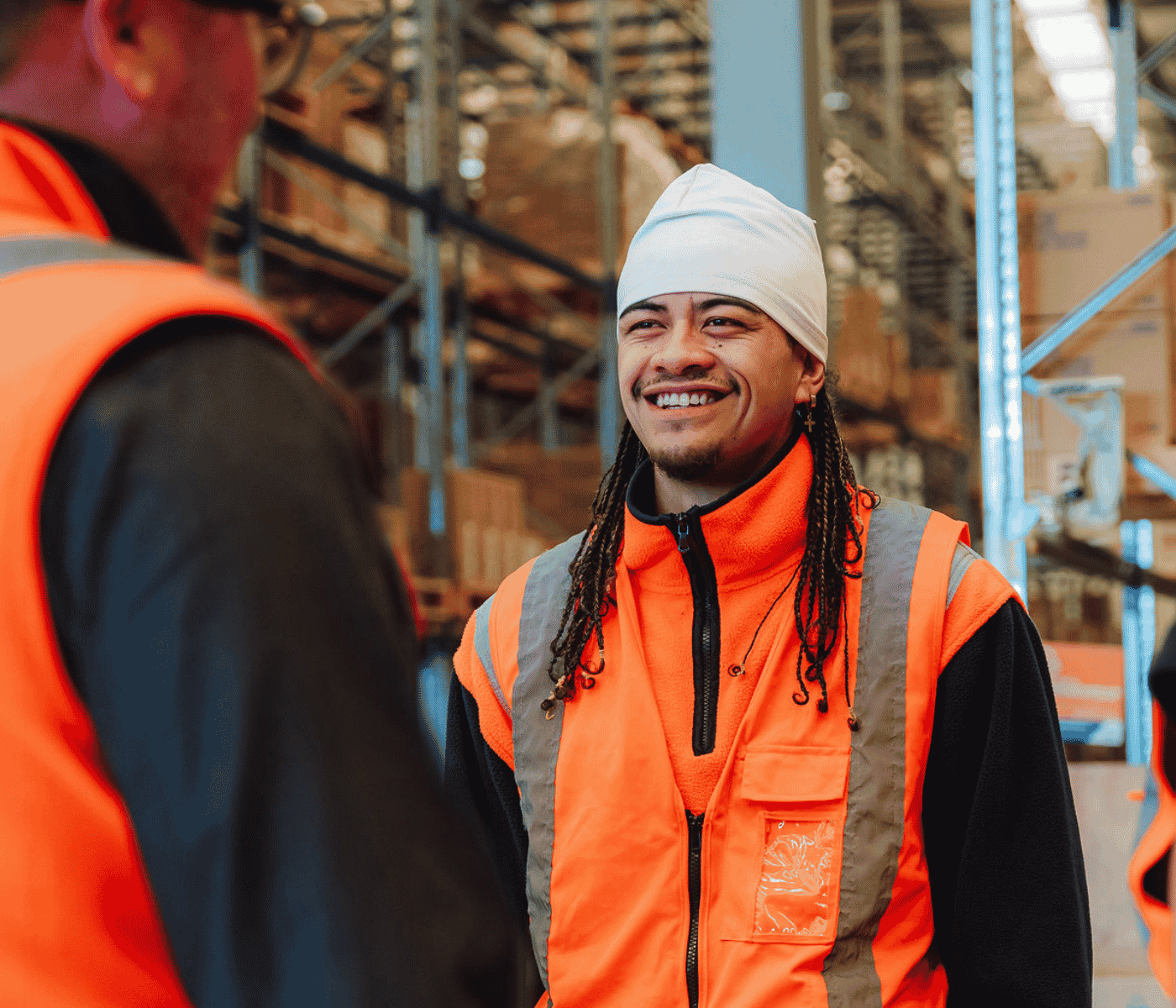Field employee smiling and talking to consultant