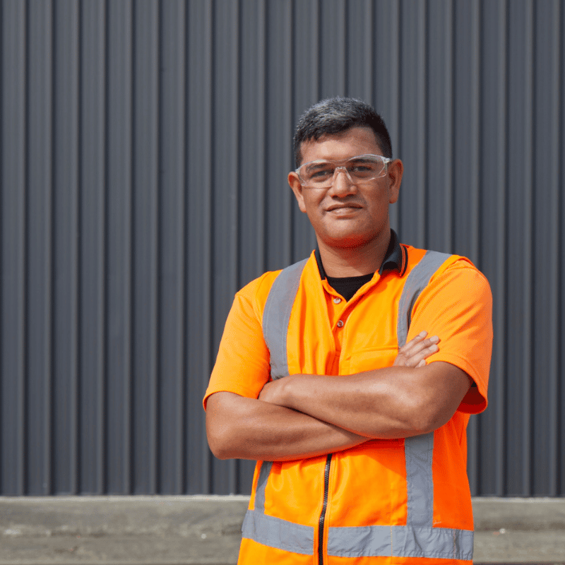 Male employee crossing arms