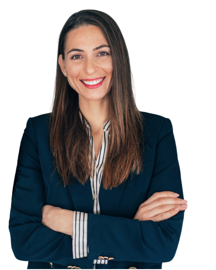 Smiling female professional with arms folded 