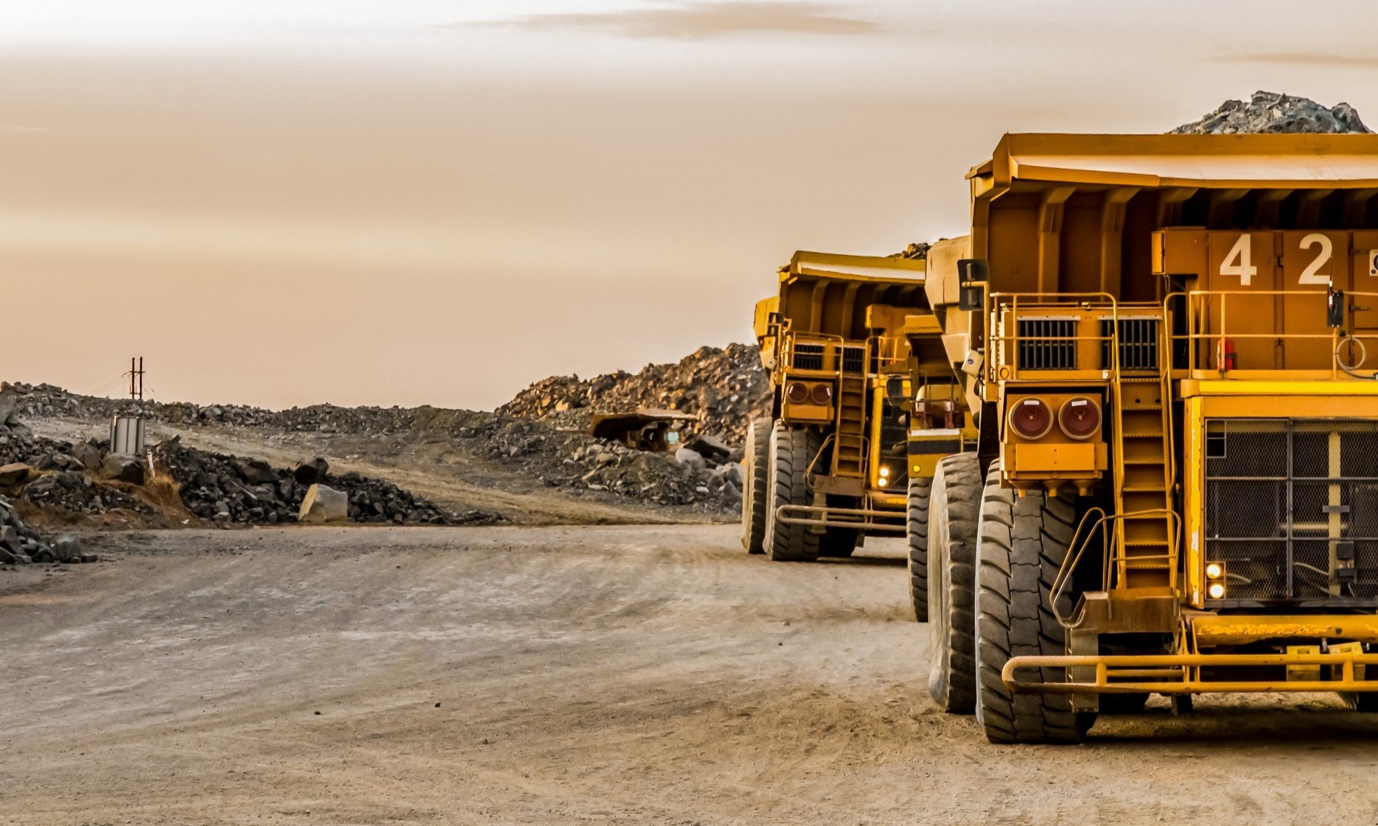 Mining tractors at a mine site.