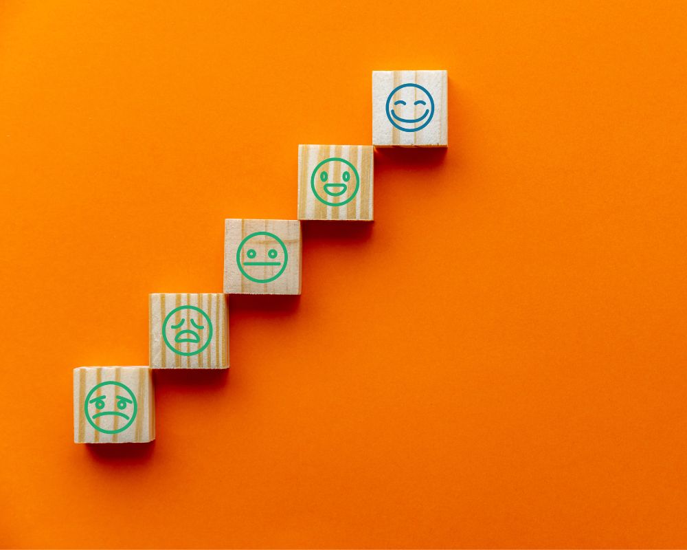 smiley face blocks on an orange background