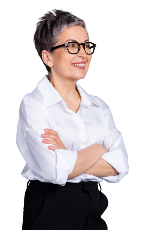 Smiling mature female professional with arms folded.