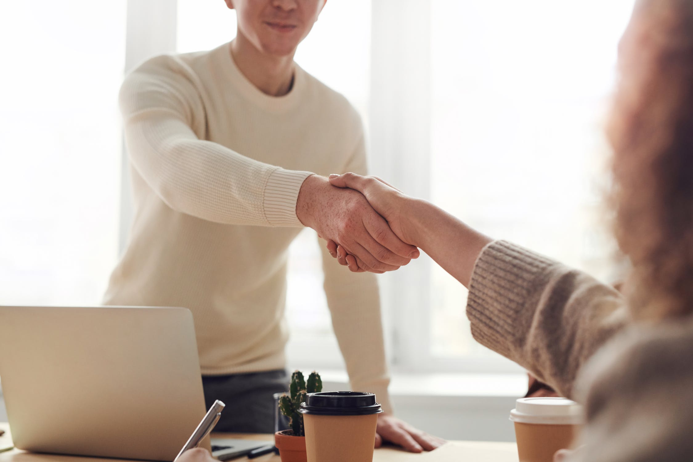 Handshake to signify successful salary negotiation