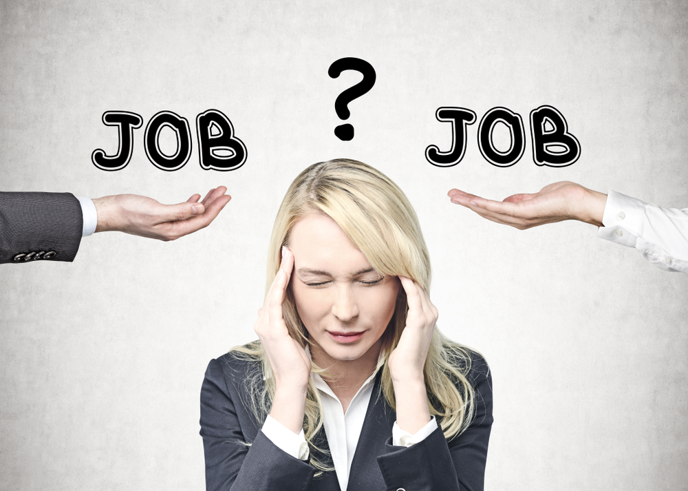 Young caucasian businesswoman with long blond hair wearing a suit having a severe headache. 