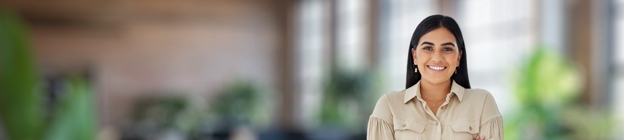 Smiling female worker in an office.