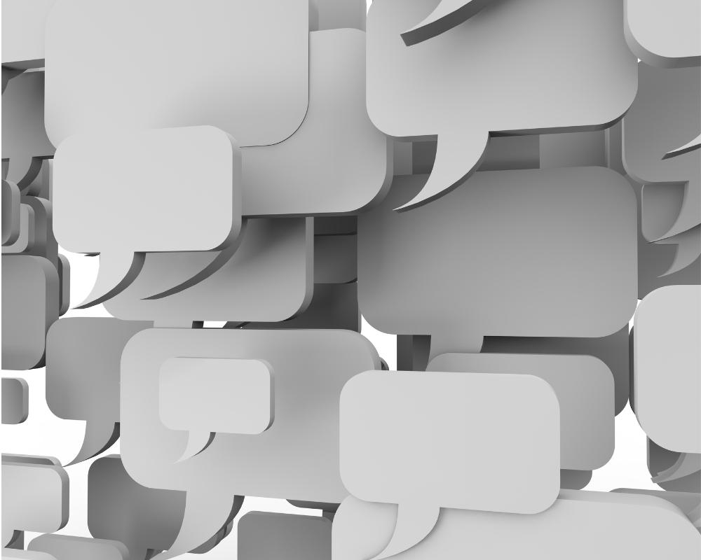 Image with many speech bubbles in gery on a white background