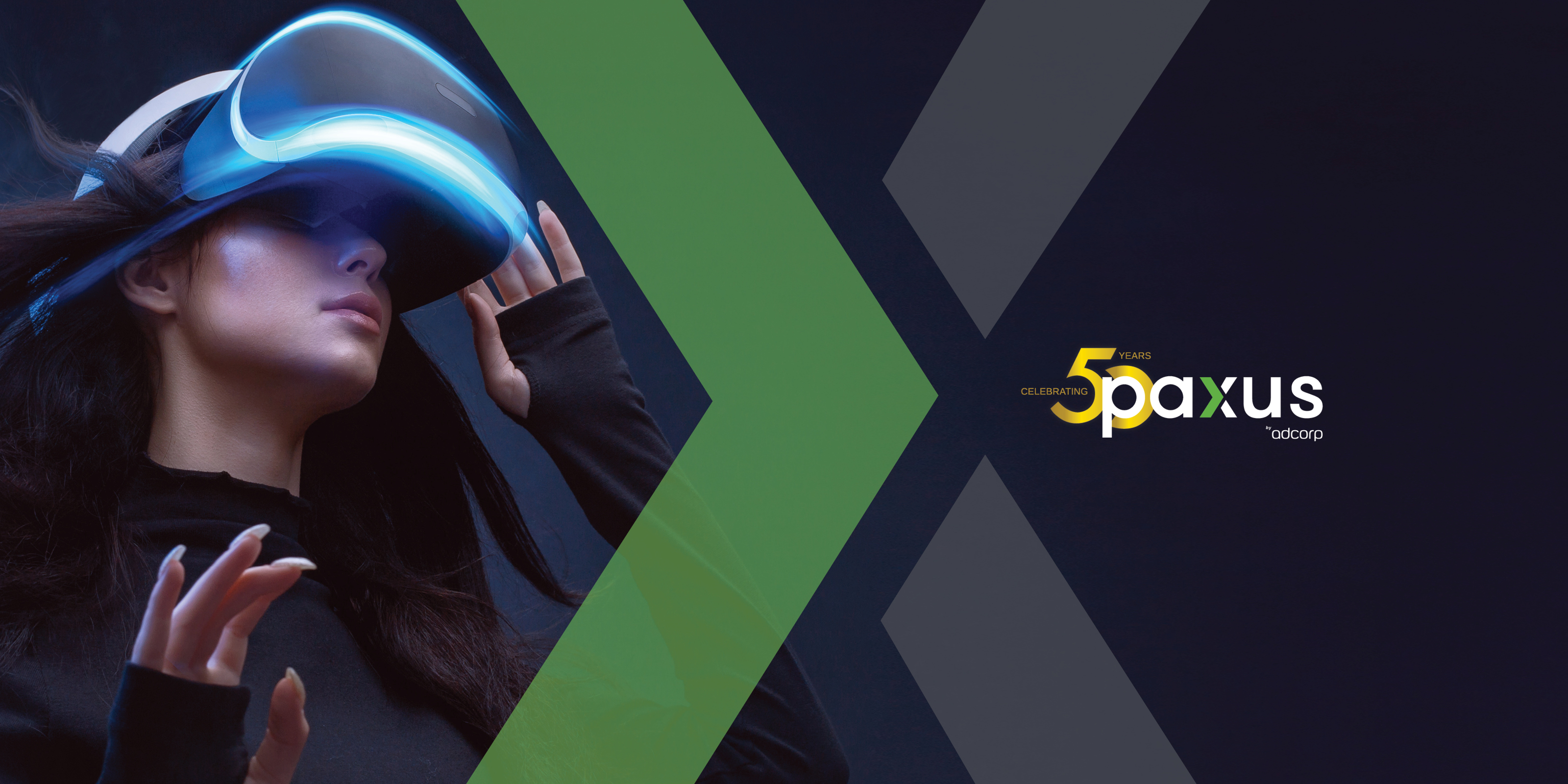 A person immersed in a virtual reality experience, wearing a futuristic vr headset, highlighted by a vibrant blue light, set against an abstract background split by geometric shapes, with the paxus logo commemorating 50 years.