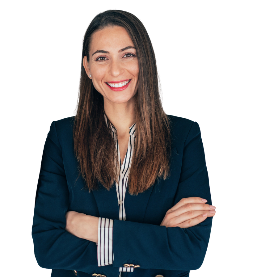 Smiling female professional with arms folded.