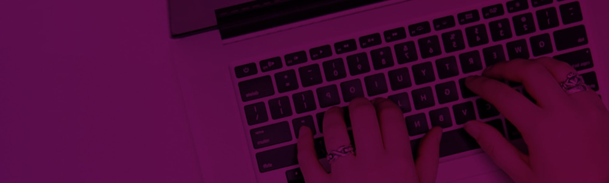 person typing on keyboard in CGC Recruitment office