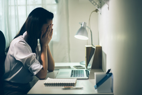 Woman is stressed at work