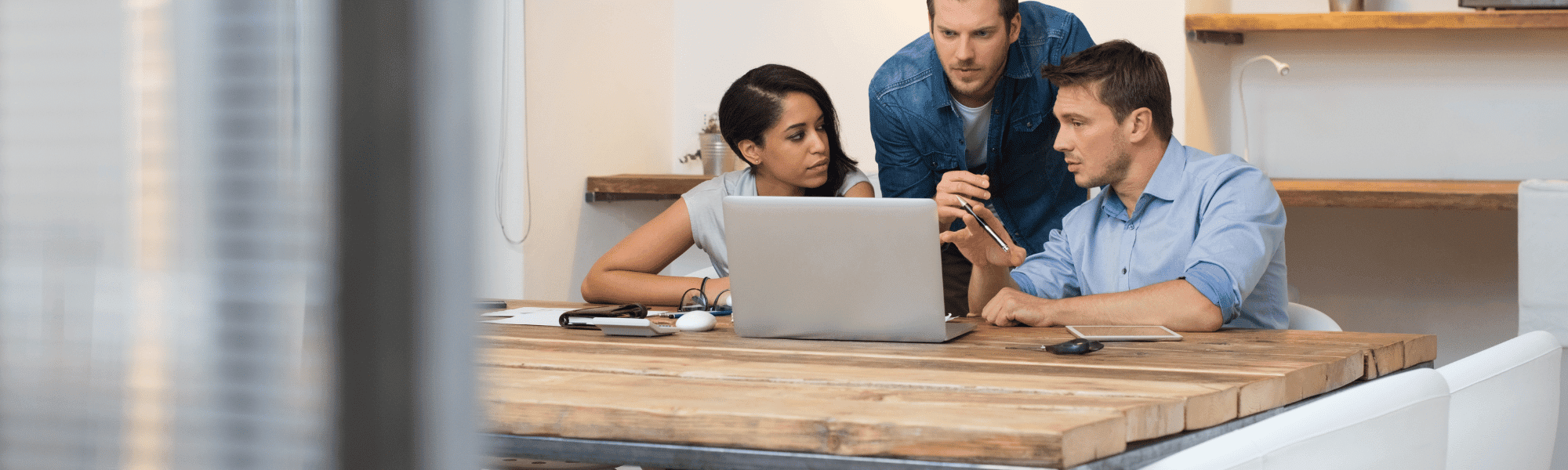 A team of professionals working together in a collaborative environment.