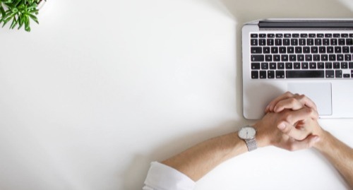 Young business man with a laptop