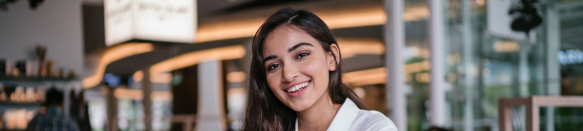 Young graduate smiling. 
