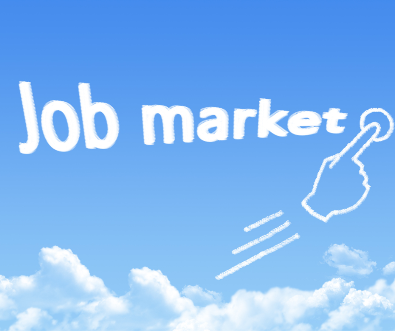 Cloud-shaped text reading ‘Job Market’ with a hand icon, symbolising navigating the evolving job market landscape