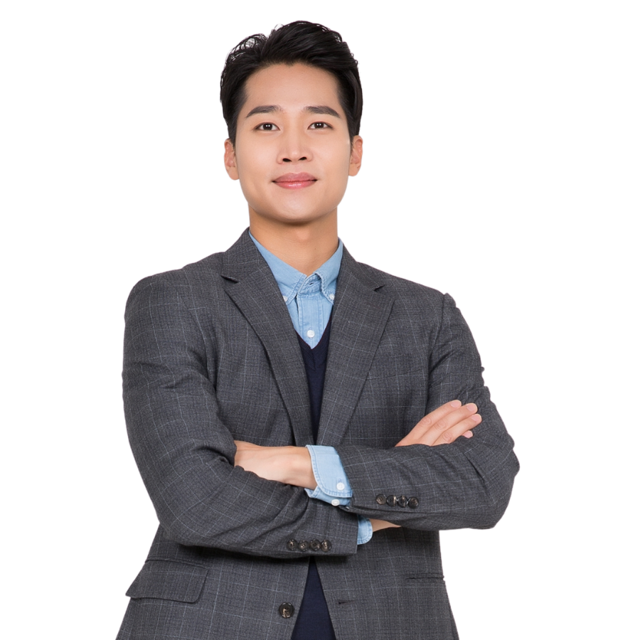 Young male professional with arms folded.
