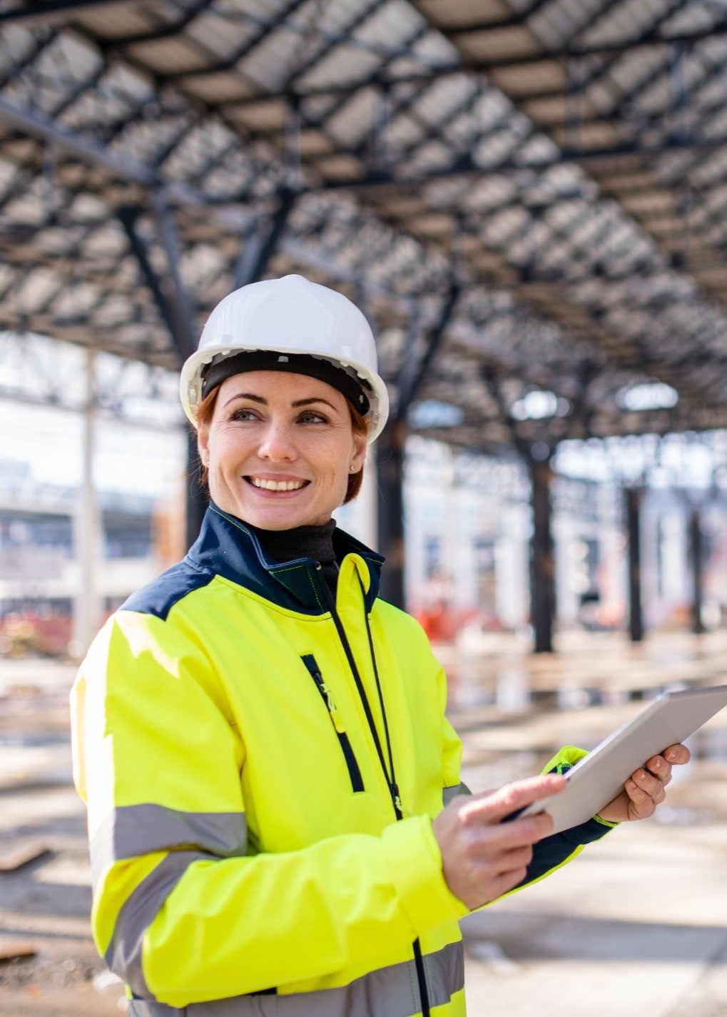 Contractor smiling at work site 