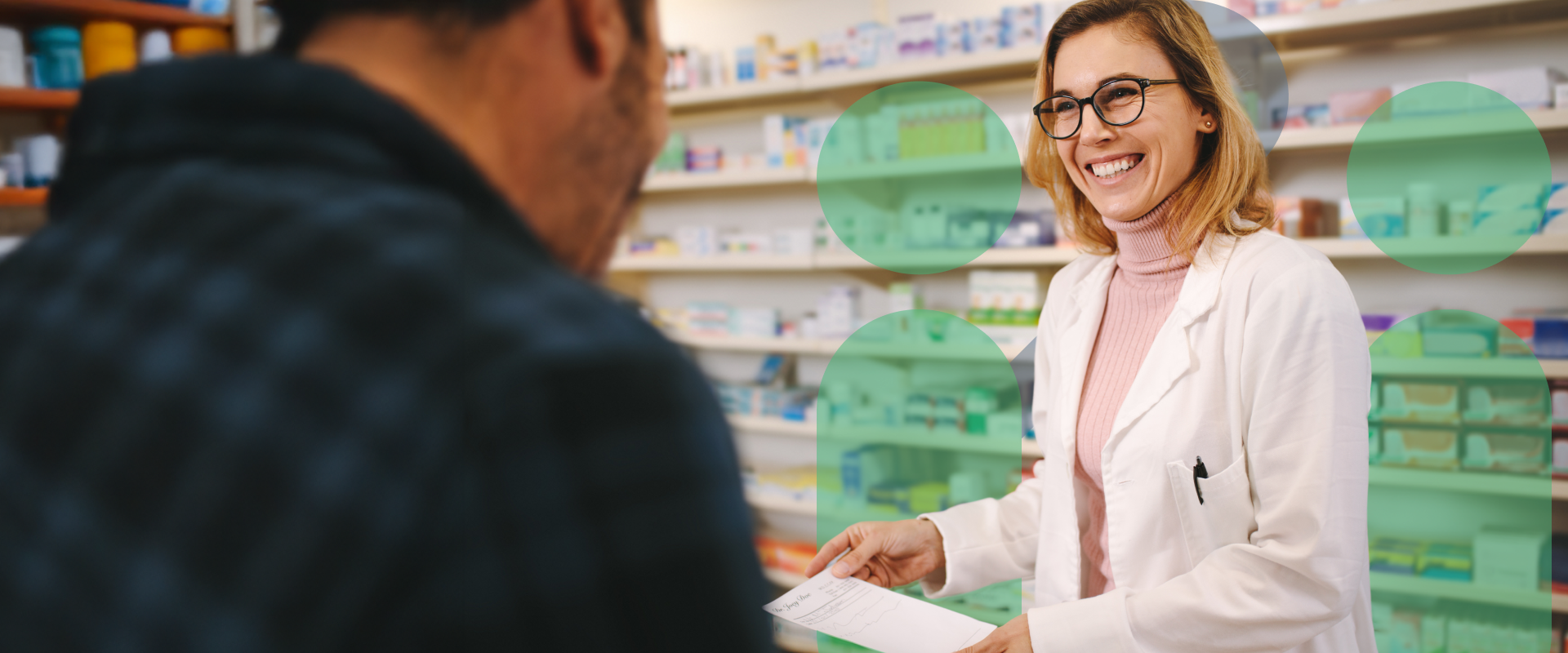 image of pharmacist showing prescriprion to customer