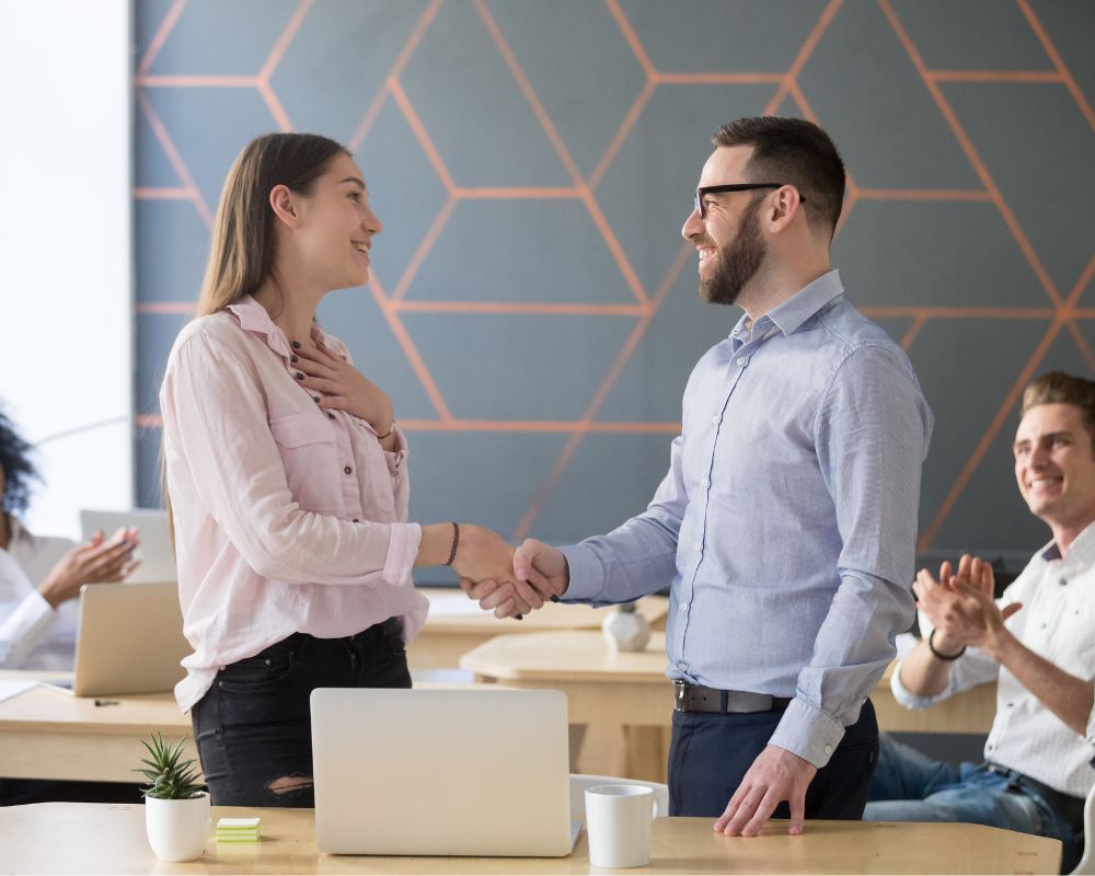 A person recieving recognition at work