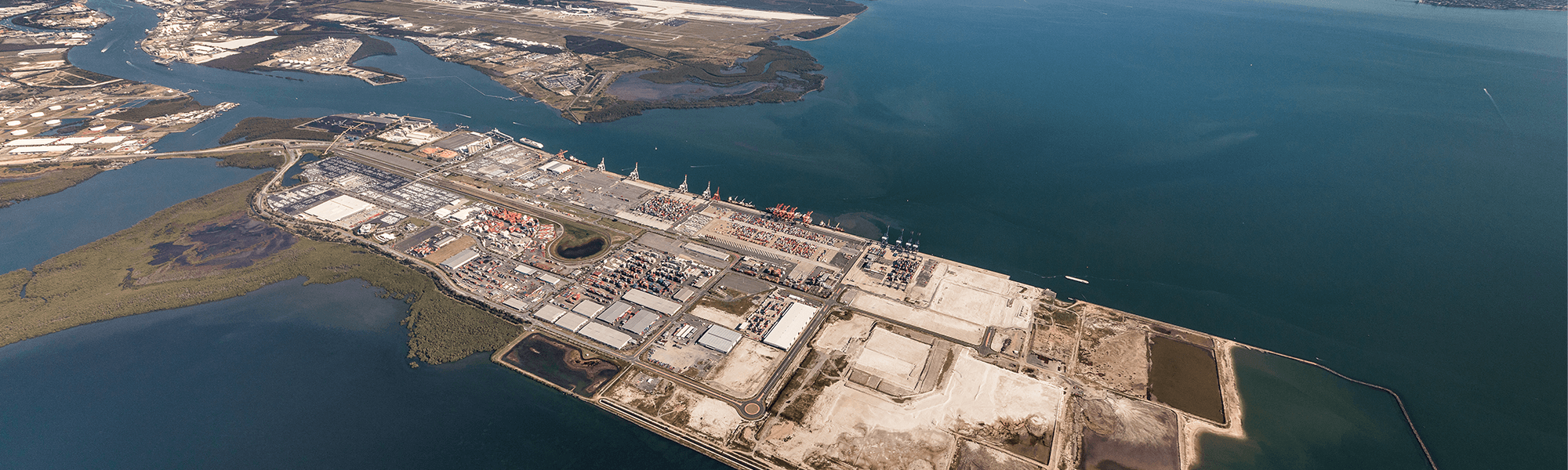 aerial view of port of brisbane showing its industries