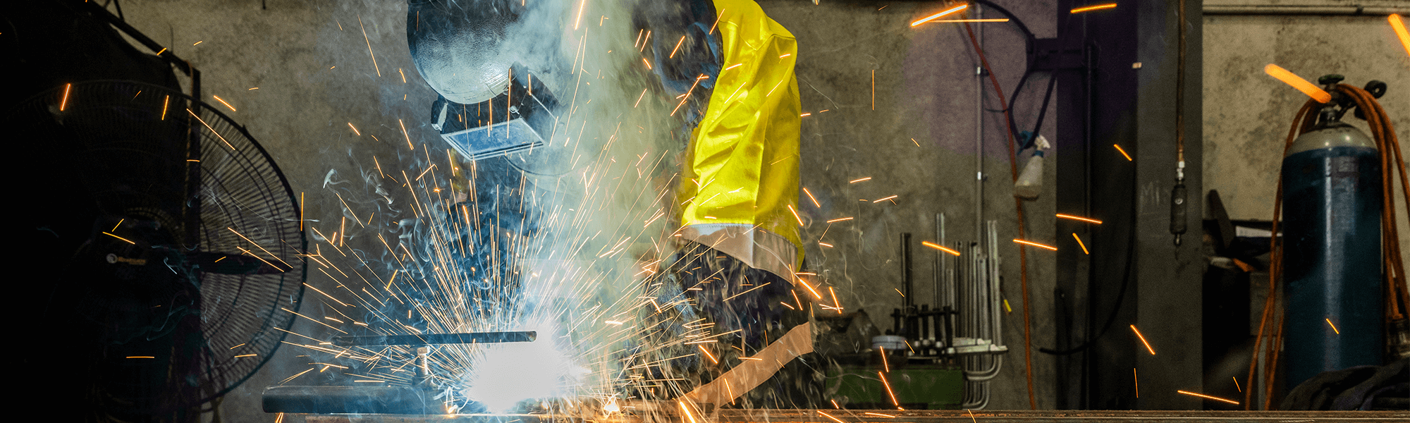 Manufacturing worker welding