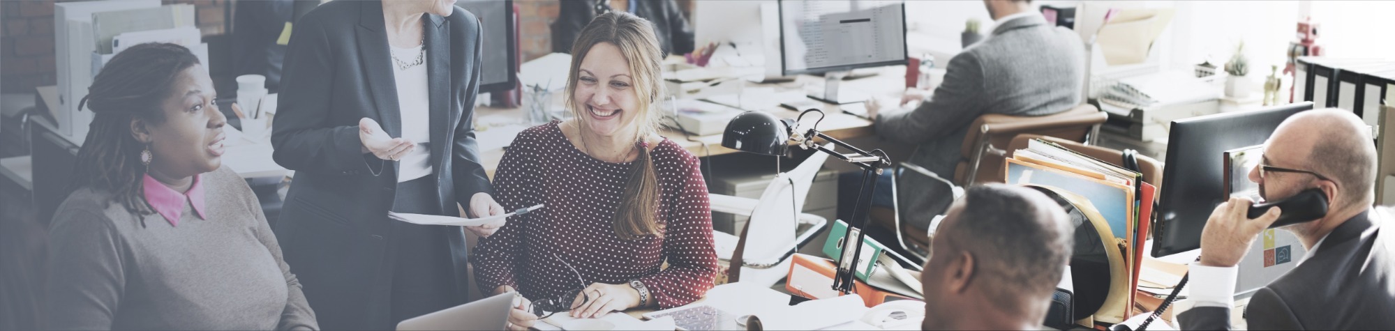 Business people smiling in a meeting