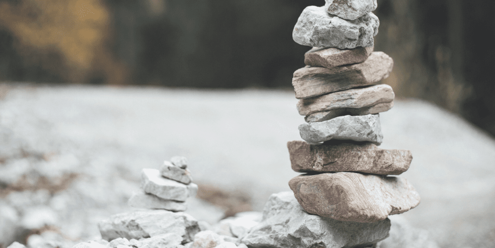 Stones stacked in a small and large pile