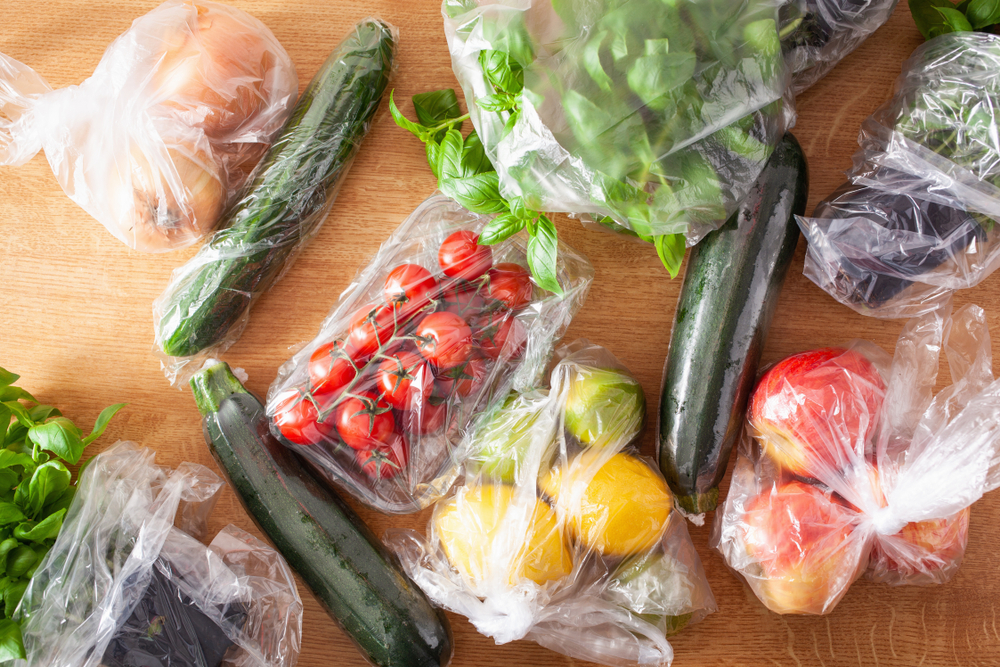 Fruits and vegetables in plastic bags