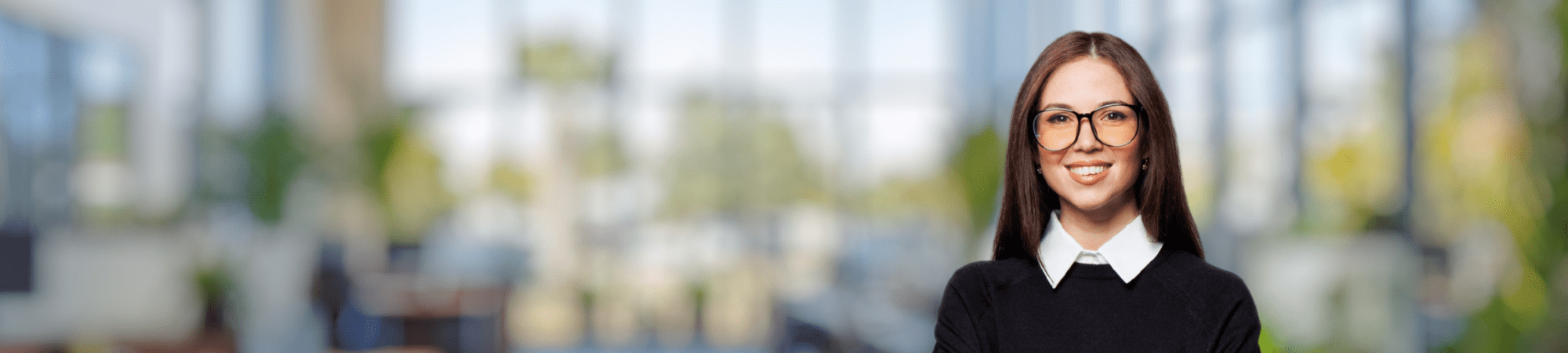 Female professional wearing glasses.