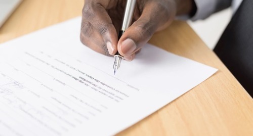 Man holding a pen